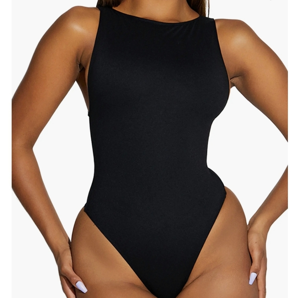 naked wardrobe Hard to Per-Suede Thong Bodysuit Size Med